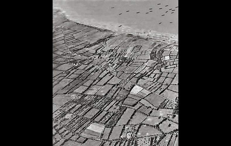 An aerial view of Omaha Beach reveals an inland patchwork of French farms and fields, divided by hedgerows providing ideal cover for German defenders.