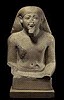 UPPER PART OF THE STATUE OF A MAN