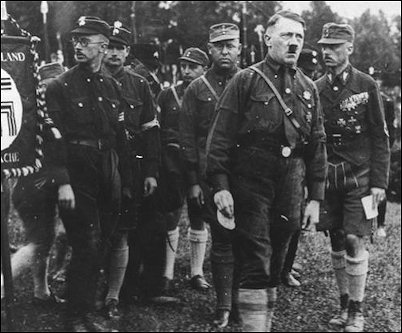 Adolf Hitler mingles with Nazi storm troopers during the 1927 Nuremberg Rally. 