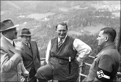 Baldur von Schirach (right) listens to Hitler as Martin Bormann and Hermann Goring watch--atop Hitler's spectacular mountain retreat on the Obersalzberg along the German-Austrian border.