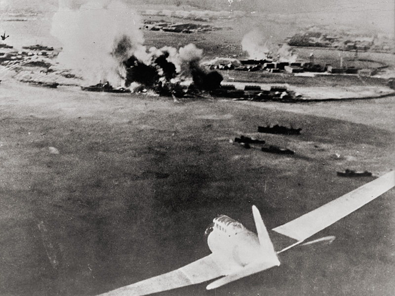 Aerial photo taken by a Japanese pilot shows a bomber plane in action during the Pearl Harbor attack.