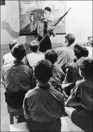 A classroom run by the Hitler Youth in the Odenwald School features rifle instruction. 